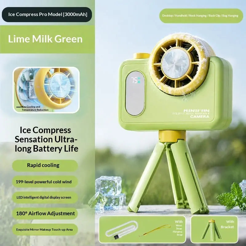 Retro camera handheld fan in use outdoors