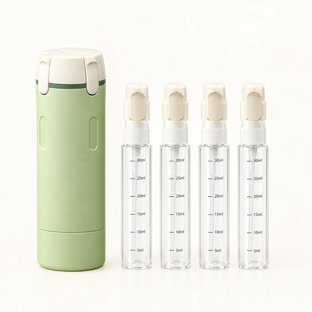 Four clear 30ml bottles that fit inside the dispenser