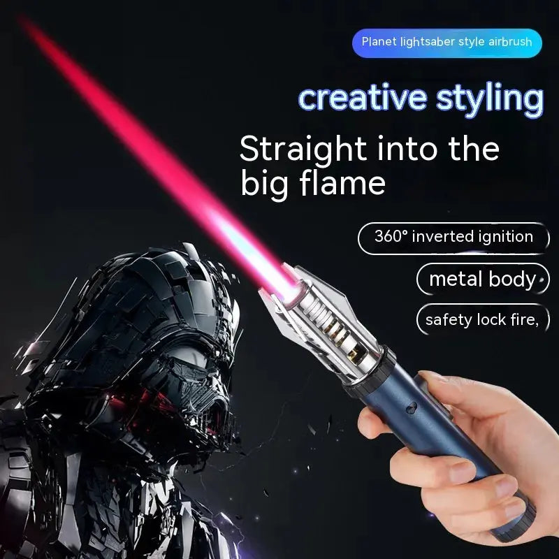 Hand holding the slim metal torch lighter, showing its glowing blade and product features
