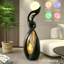Decorative floor lamp with USB charging feature in a living room setting