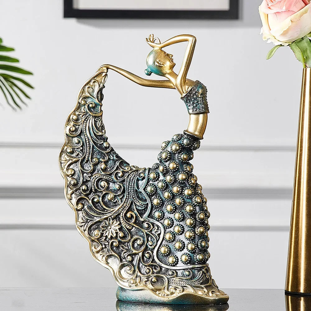 Hand-finished detail of the peacock dancer figurine