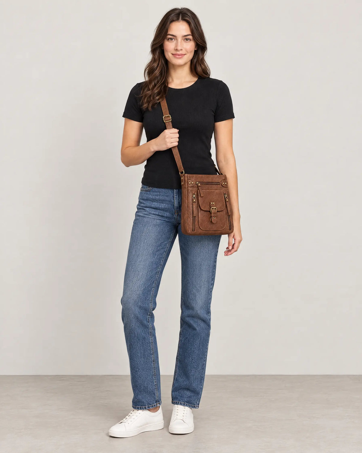 Retro square bag worn crossbody to show its size on the body