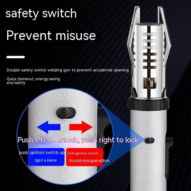 Close-up of the torch lighter safety switch on a dark background