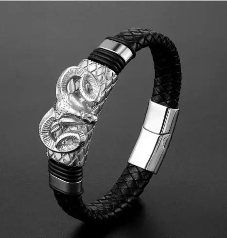 Men's braided leather bracelet worn on wrist with casual outfit