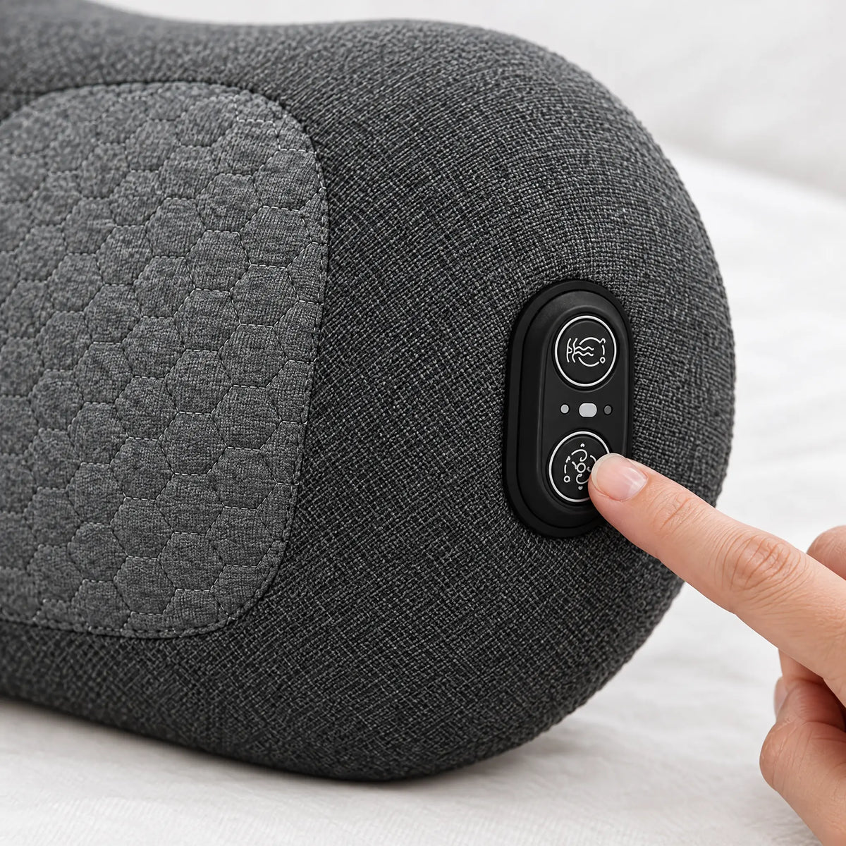 Pressing the control button on the lumbar pillow