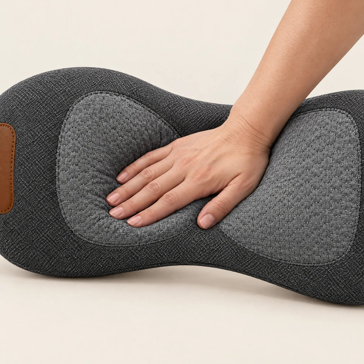 Hand pressing into the memory foam