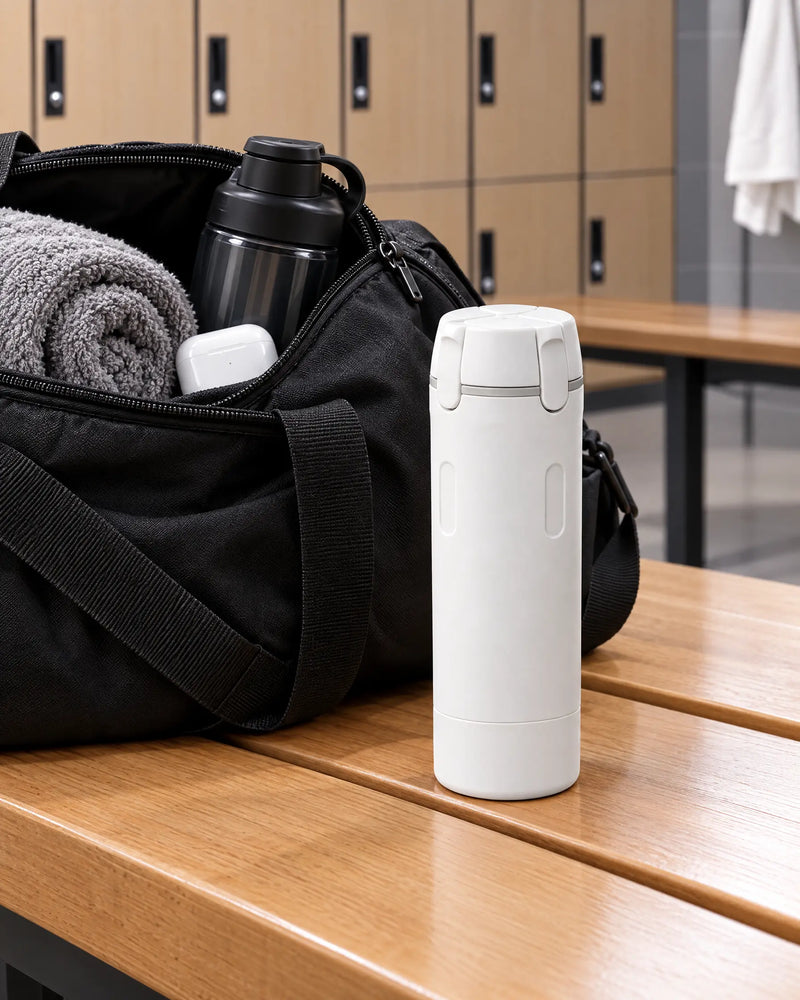 Travel dispenser next to a gym bag