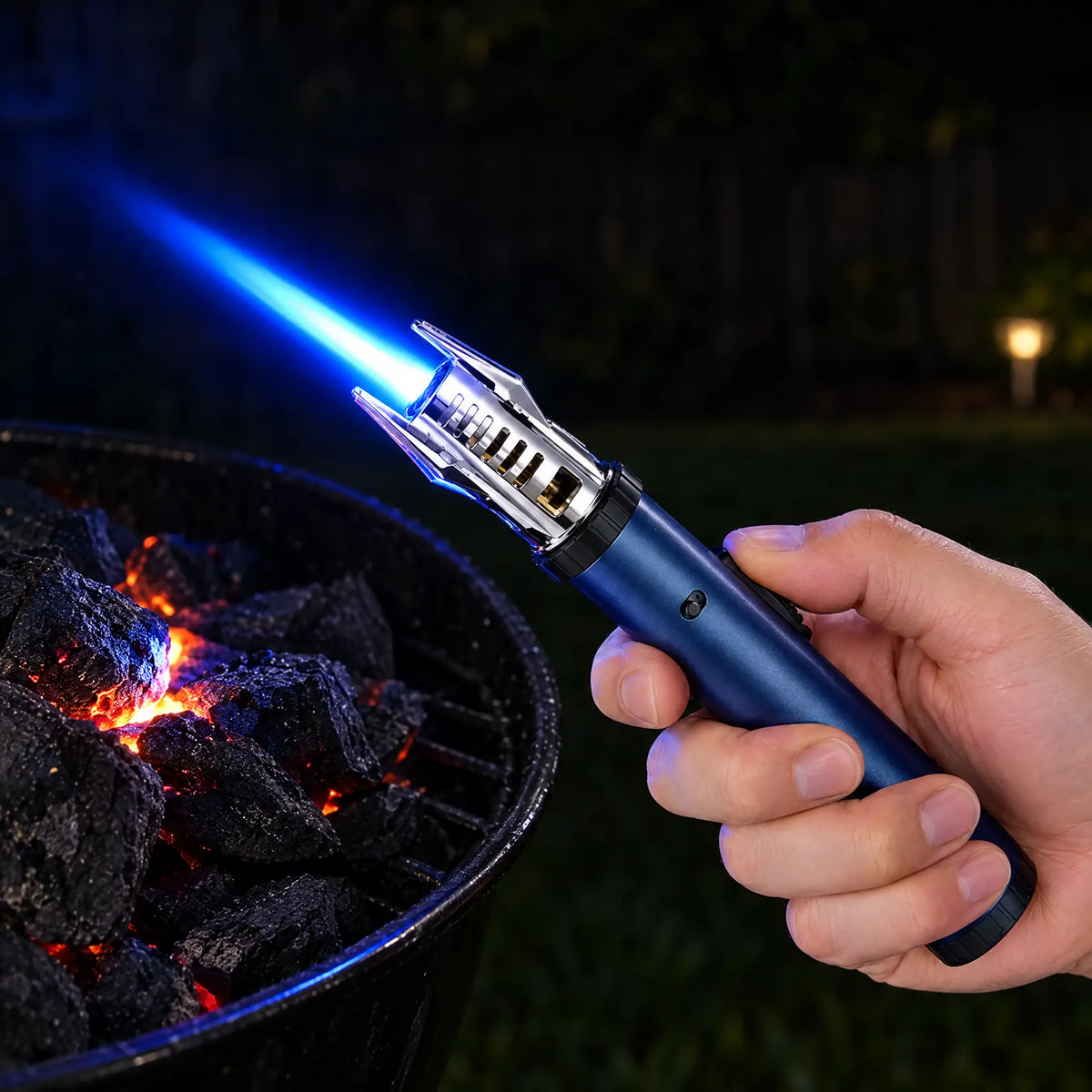Lighting barbecue charcoal with the torch lighter